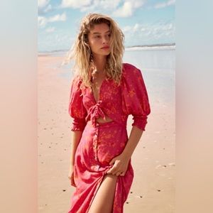 Free People String Of Hearts Printed Maxi Dress
Pink Combo
Size: XL